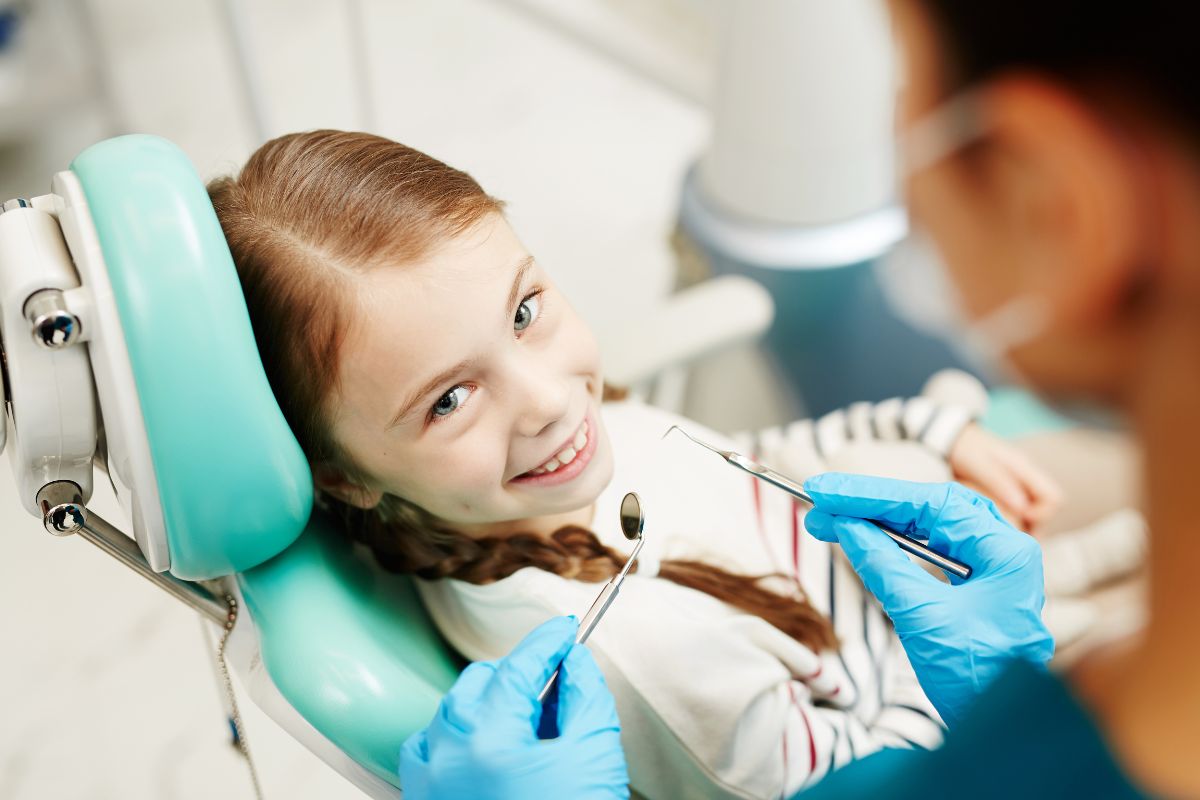 Child enjoying a friendly dental checkup.