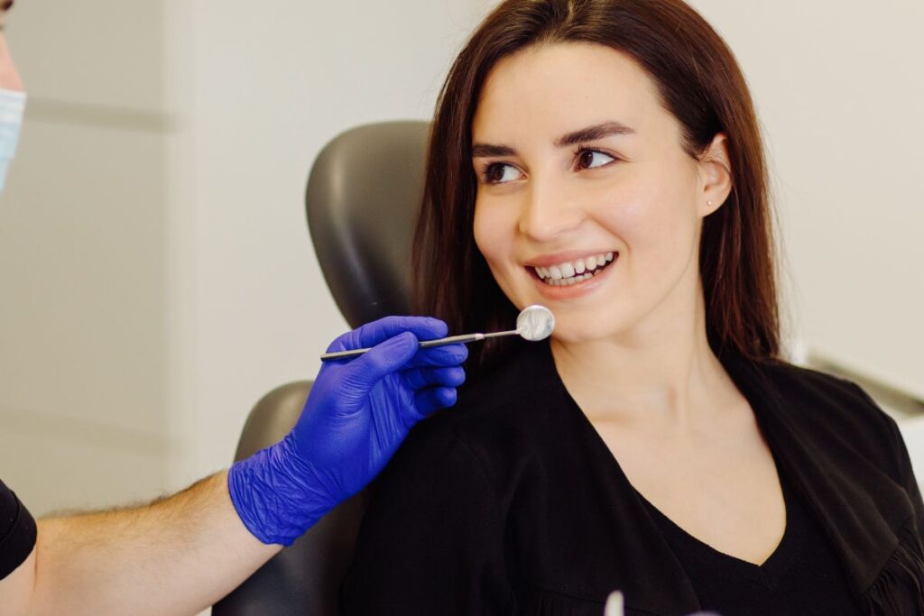 Patient smiling after cosmetic dentistry.