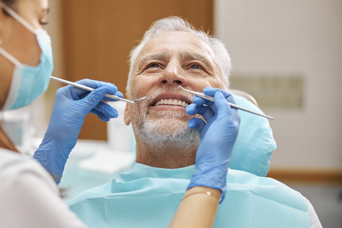 Patient receiving a routine dental checkup at a modern dental clinic.